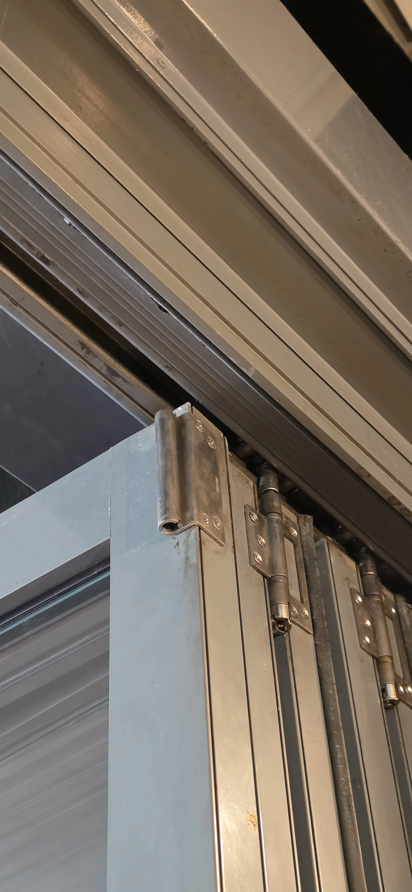 Complex Bifold Top Track & Hinge Servicing